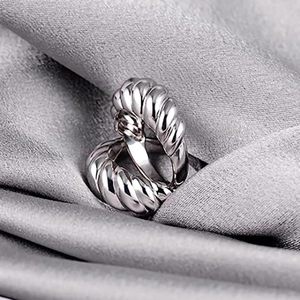 Silver twisted croissant ring set in polished metal finish for men and women