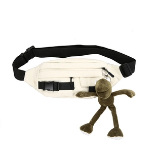 Japanese style cream canvas chest bag with adjustable strap and cute monkey charm