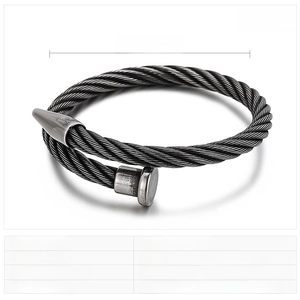 Macro shot of punk nail bracelet in distressed black stainless steel showing 58x6mm size