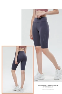 Detail view of high-waist yoga shorts in grey blue with ergonomic streamlined stitching