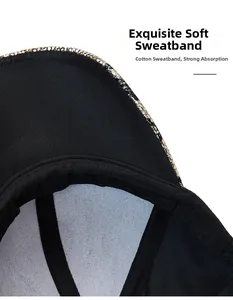 Detailed view of the internal cotton sweatband and gold snakeskin brim of a baseball cap