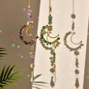 Moon-shaped suncatchers with amethyst and aventurine stones featuring faceted prisms