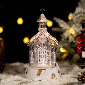 Christmas crystal church music box with warm LED lighting and golden glitter decor