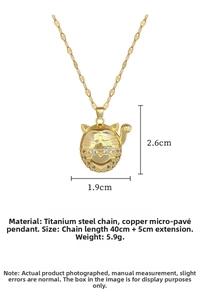 Detailed close-up of a gold-plated lucky cat pendant necklace with micro-pave crystals