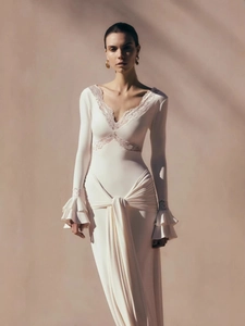 Elegant white lace patchwork V-neck maxi dress with long ruffle sleeves and cinched waistline