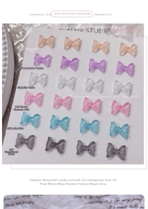 Macro shot of 50pcs colorful resin bowknot nail charms in varied translucent jelly colors
