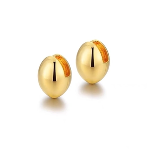 Polished gold teardrop huggie earrings with a sleek oval-shaped metallic finish