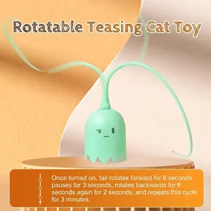 Smart automatic rotating cat toy in mint green ghost design with 360 degree spin function