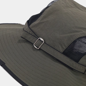 Detail of olive green sun hat showing breathable black mesh and durable brim stitching