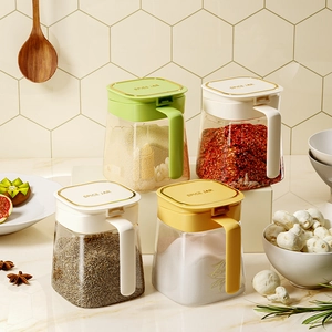 Multifunctional glass spice jar set with colored lids and gold trim for kitchen storage