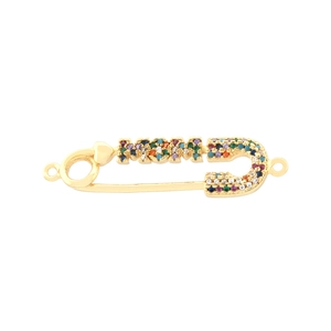 Detail of gold safety pin brooch with MOM lettering and colorful zircon inlay