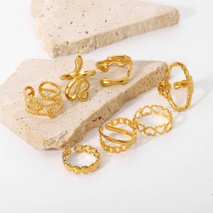 7-piece set of 18K gold plated stainless steel rings with snake and heart designs