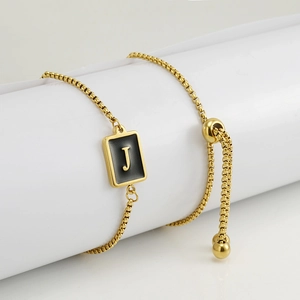 Adjustable 18K gold plated stainless steel square charm bracelet featuring letter J