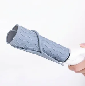 Gray heat-resistant silicone mat for hair straighteners with non-slip wavy texture