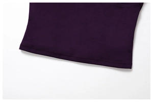 Macro shot of double-needle stitching on the hem of a dark purple fitness tank top