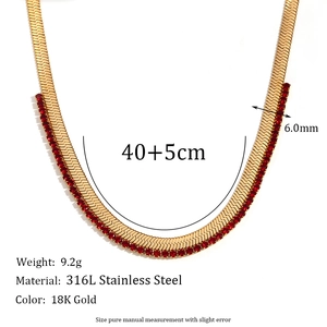 Detail of 18K gold-plated stainless steel snake chain necklace with red zircon stones