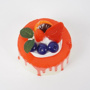 10cm artificial round mousse cake toy with realistic fruit toppings and orange glaze