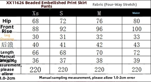 Detailed size chart for floral skort with beaded trim showing XS to L measurements