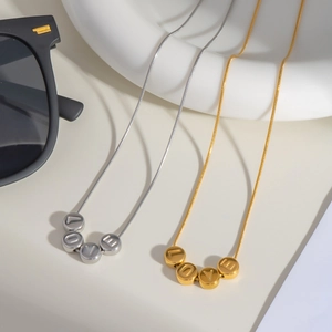 Minimalist gold and silver snake chain necklaces with LOVE engraved round beads