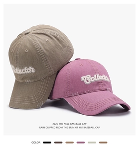 Detail of 3D embroidered Collector text on vintage washed cotton baseball caps