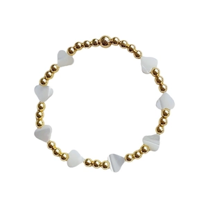 18K gold-plated beaded bracelet featuring natural shell heart charms and elastic cord