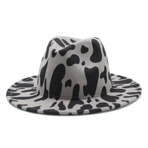 British style wool fedora hat with gray cow print pattern on a white background