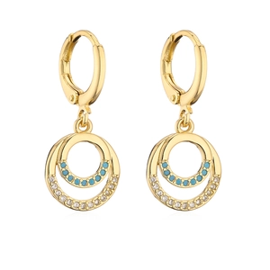Detail of 18K gold plated hoop earrings featuring micro-pave blue and white zircon stones
