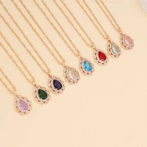 Multi-color pear-cut gemstone necklaces with sparkling halo on golden twist chains