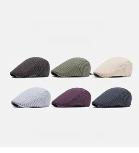 Detail view of British vintage plaid flat caps in six versatile color patterns