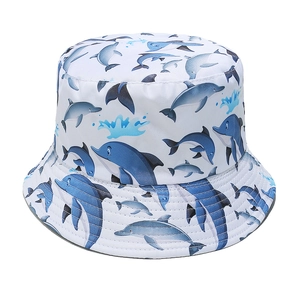 White fisherman sun hat with blue dolphin prints and decorative water droplets patterns