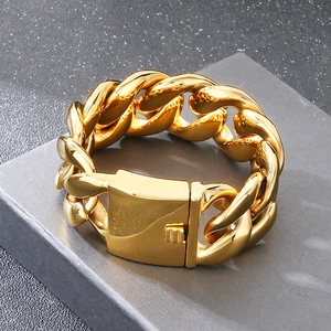 Detailed close-up of 30mm thick gold-plated stainless steel Cuban link chain bracelet
