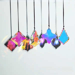 Detail view of AB aurora coated crystal suncatchers in various geometric shapes