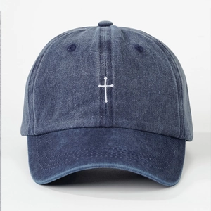 Classic washed denim baseball cap in navy blue with minimalist white cross embroidery