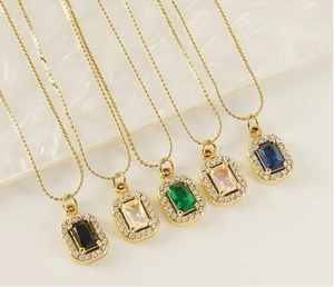Detail of five-color square zircon pendants on gold chains with luxury water-wave background