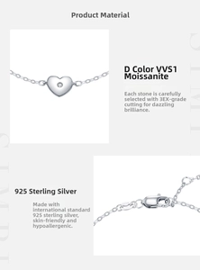 Détail macro du fermoir en argent sterling S925 et du charm coeur en moissanite