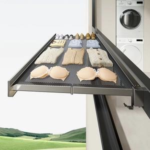 Foldable wall-mounted balcony drying rack made of gray stainless steel with perforated mesh