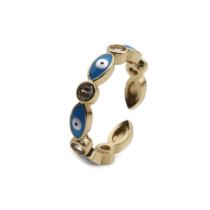 Detail showing gold copper ring with blue evil eye enamel and inlaid cubic zirconia