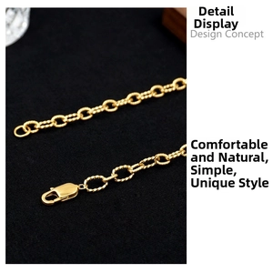 Detail of twisted curb chain link necklace with gold finish and lobster clasp closure