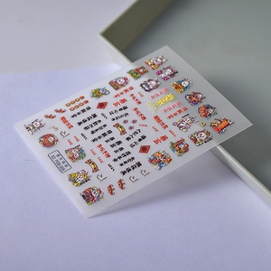 Detailed macro shot of 5D embossed nail stickers featuring traditional lucky motifs