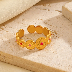 18K gold plated stainless steel open ring with round sunburst pattern and pink enamel