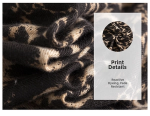 Detailed close-up of leopard print cashmere feel fabric with active dyeing texture