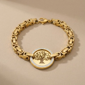 Detailed close-up of golden Tree of Life charm bracelet with sparkling white zircons