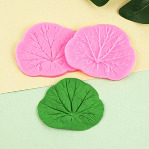 Macro detail of leaf-shaped silicone molds showing realistic textures and veins