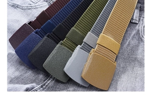 Outdoor canvas tactical belts in six colors with plastic buckles shown on denim fabric