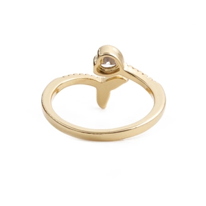 Adjustable golden fish tail ring with sparkling heart-shaped zircon inlay on white backdrop