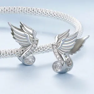 Elegant S925 sterling silver angel wing charm with cubic zirconia on snake chain
