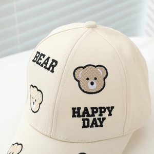 Kids cream baseball cap featuring cute embroidered cartoon bears and Happy Day text