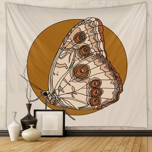 Detail of bohemian butterfly wall tapestry with warm tones for modern home decor