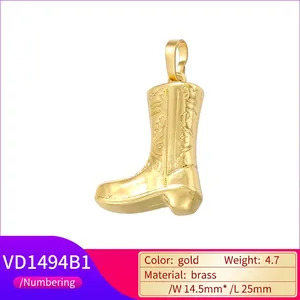 Fashionable gold brass cowboy boot pendant with cubic zirconia and high heel charm details