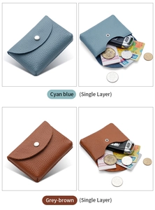 Detail of cyan blue and grey-brown mini leather coin purses with snap buttons
